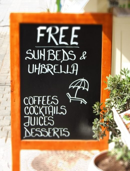 SUNBEDS & UMBRELLA in Kamari Beach